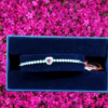 Bracelet Swarovski seconde main. Modèle Coeur rose et cristaux blancs.