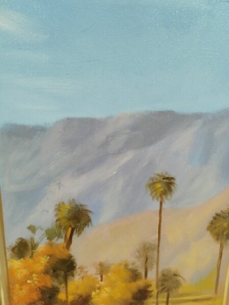 Oil painting of a desert scene with palm trees, yellow foliage, and distant blue mountains under a clear sky.